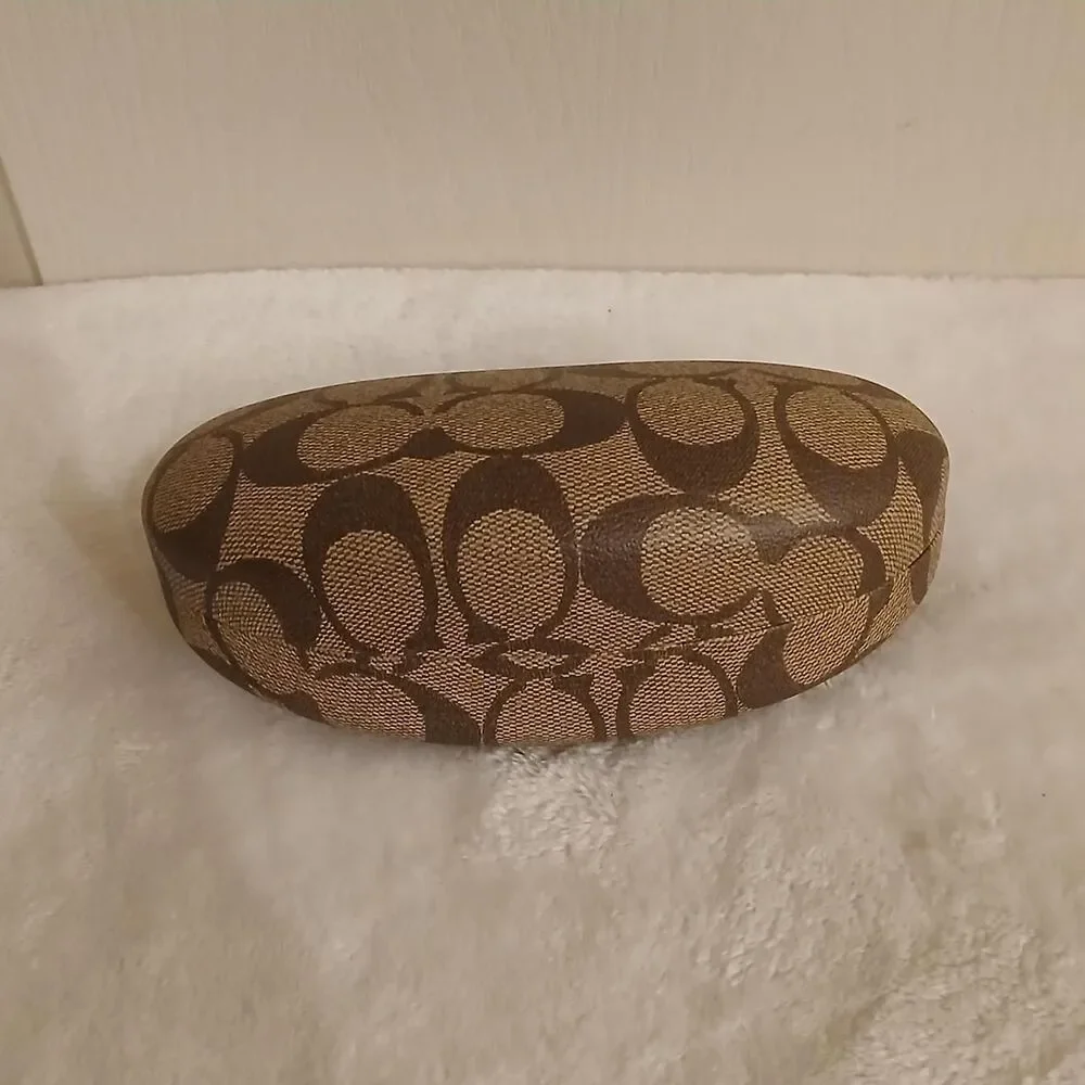 Coach clam-shell hard glasses case in brown and tan signature monogram canvas
